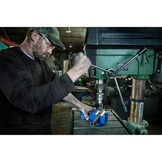 IRWIN 10503730 drill press vise clamping metal tubing in workshop.