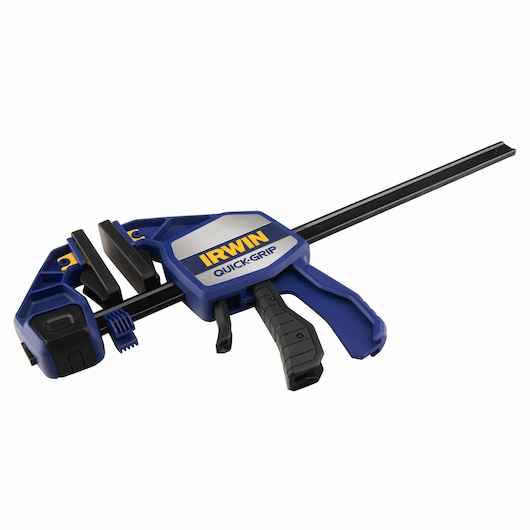 IRWIN 1964712 blue and black trigger bar clamp, side view on white background.