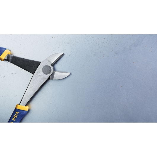 IRWIN 2078306 diagonal cutting pliers with blue and yellow handles on metal surface, top view.
