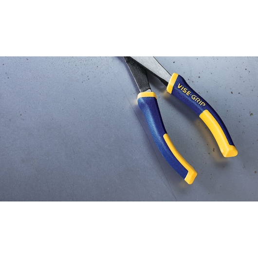 Photo of IRWIN VISE-GRIP pliers 2078306 with blue and yellow handles, close-up on a metal surface.