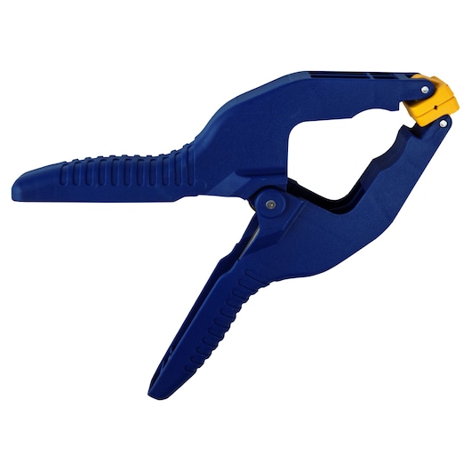 IRWIN 58300 blue plastic spring clamp with yellow jaw pad, side angle on white background.
