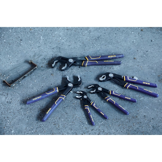 IRWIN 2078112 groove joint pliers set with six purple and yellow handles on a concrete surface.