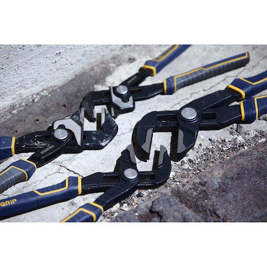 Photo of IRWIN IRHT82636 adjustable groove joint pliers with blue and yellow handles on a concrete surface.