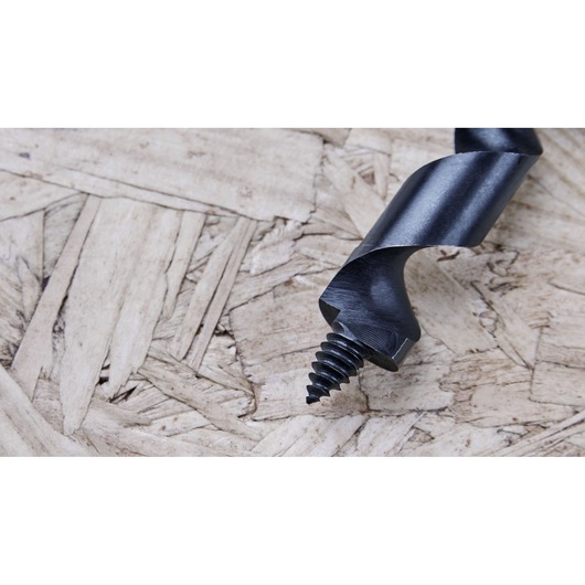 Close-up photo of IRWIN auger drill bit IWAX3008 with screw tip on wood surface.