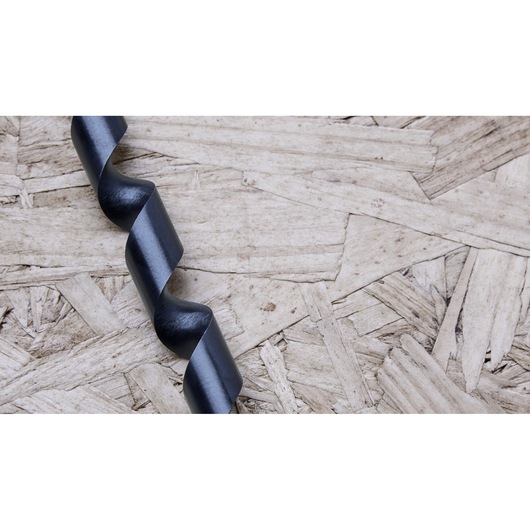 Closeup of IRWIN auger drill bit IWAX3008 with black finish on wood panel background.