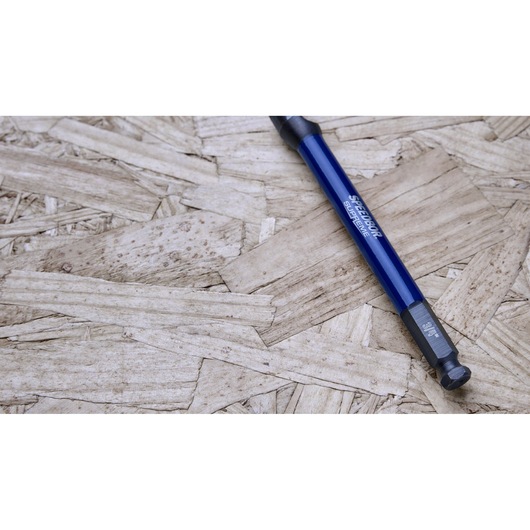 IRWIN IWAX3008 blue screwdriver bit holder on a wood textured surface, angled side view.